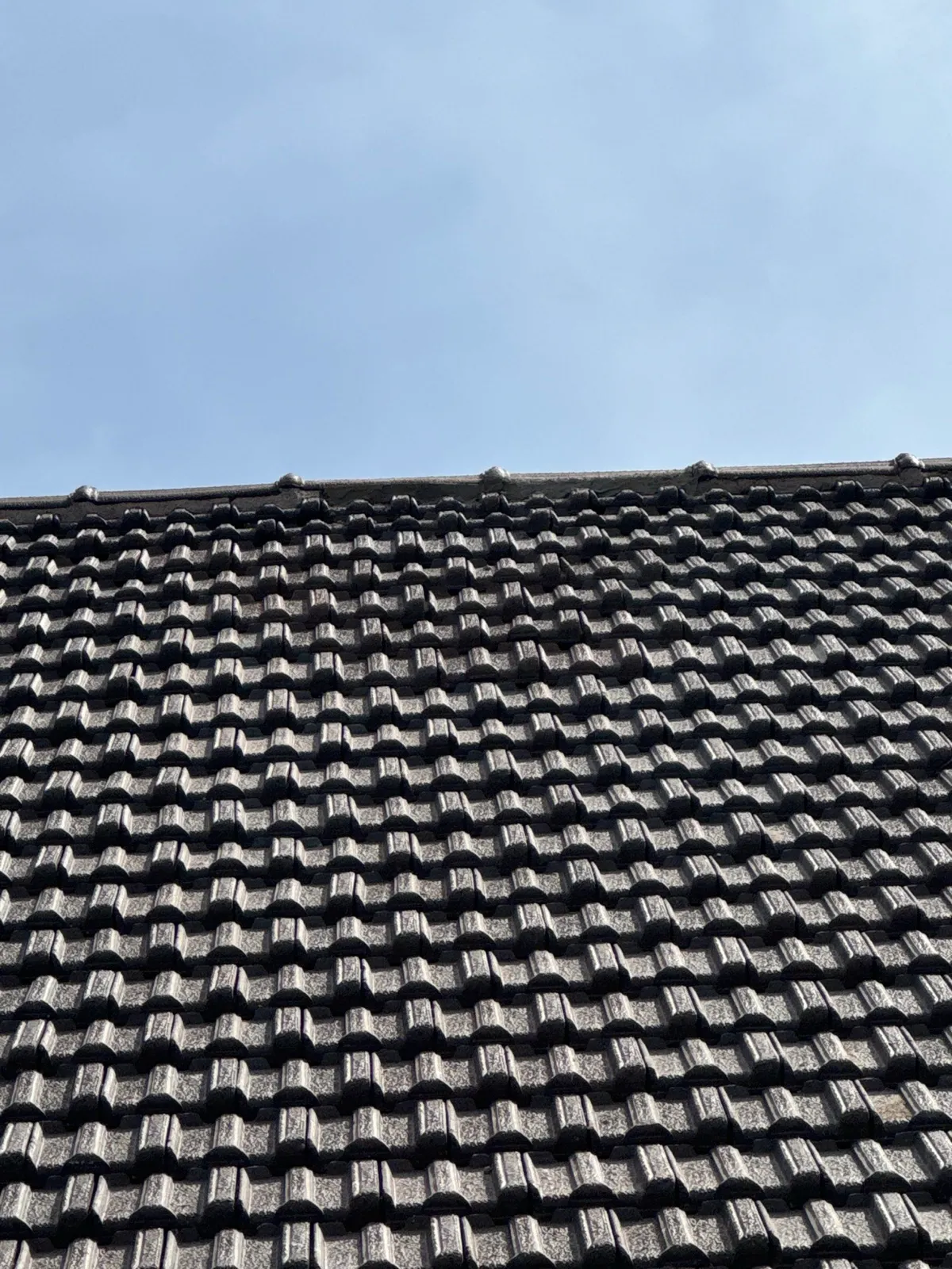 Toiture en tuiles neuves posées par Caruelle Couverture